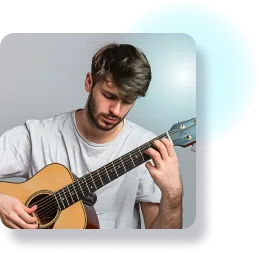 a man plays on a guitar